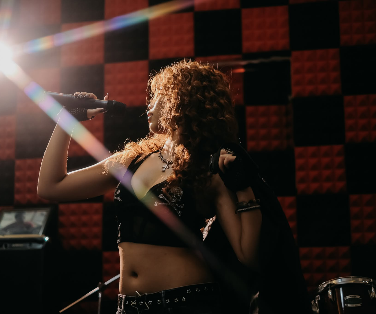 Dhafney performing on stage